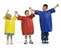 Three children wearing aprons