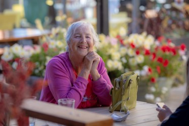 Lois Ingellis sitting at a picnic table