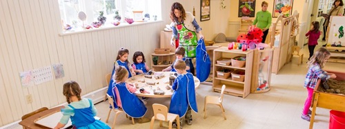 children playing in a classroom