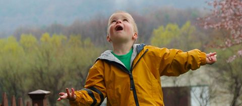boy wearing a rain coat