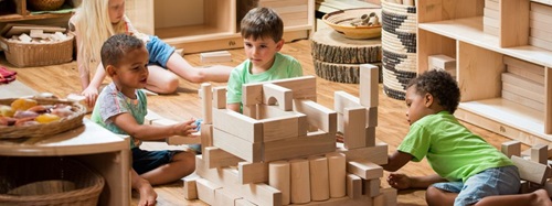 children building with blocks