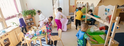 children playing in a classroom