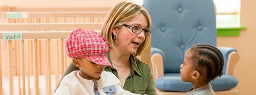 teacher with two children