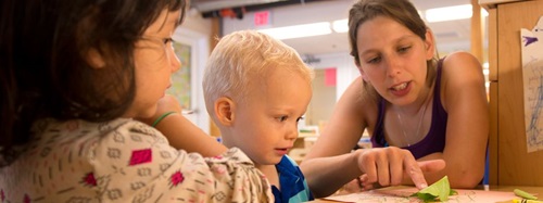 teacher with two children