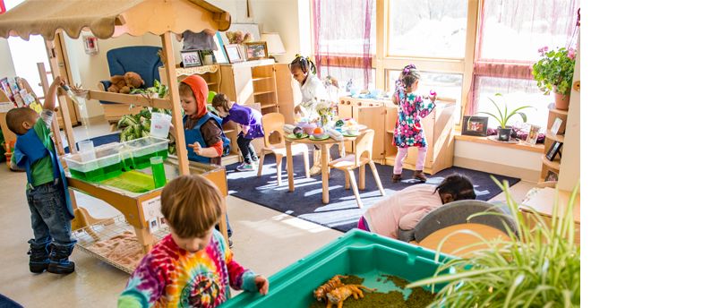 Preschool children playing in classroom