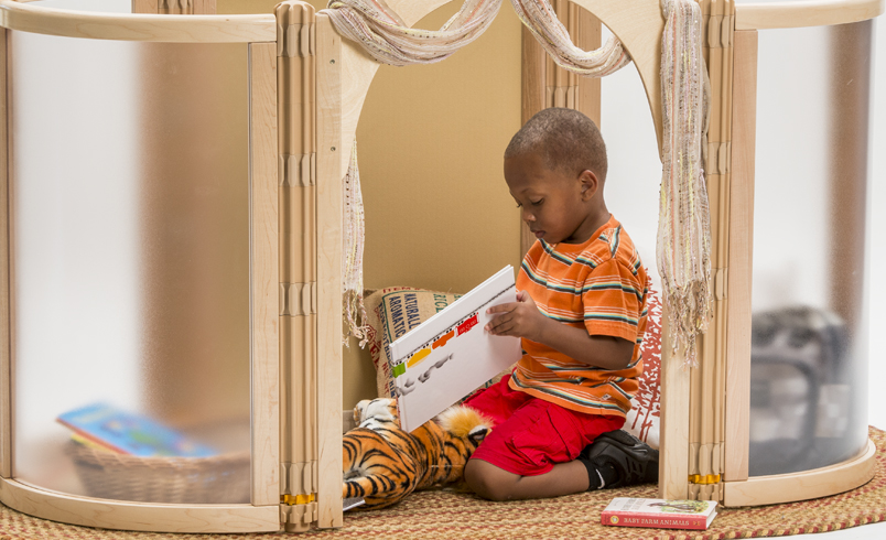A child reading a retreat space