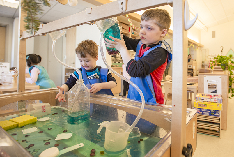 Children using a water table for a STEM project