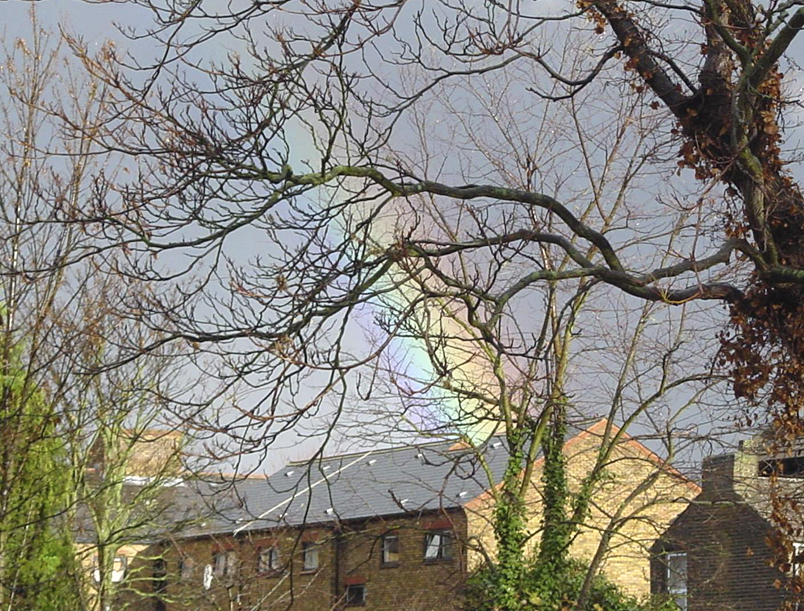 Rainbow over a building