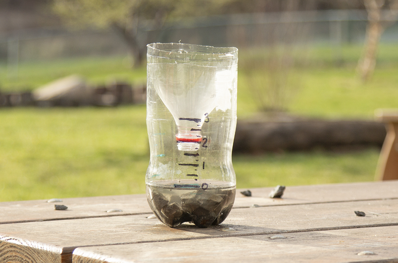 Soda bottle rain gauge assembled