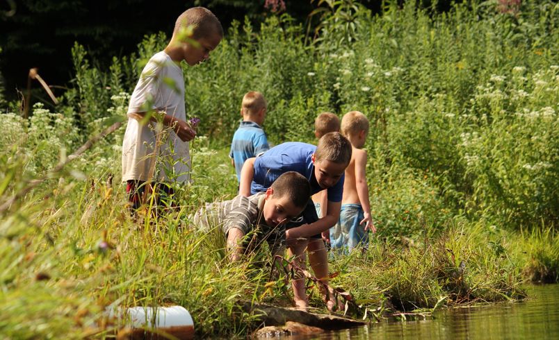 kids by pond