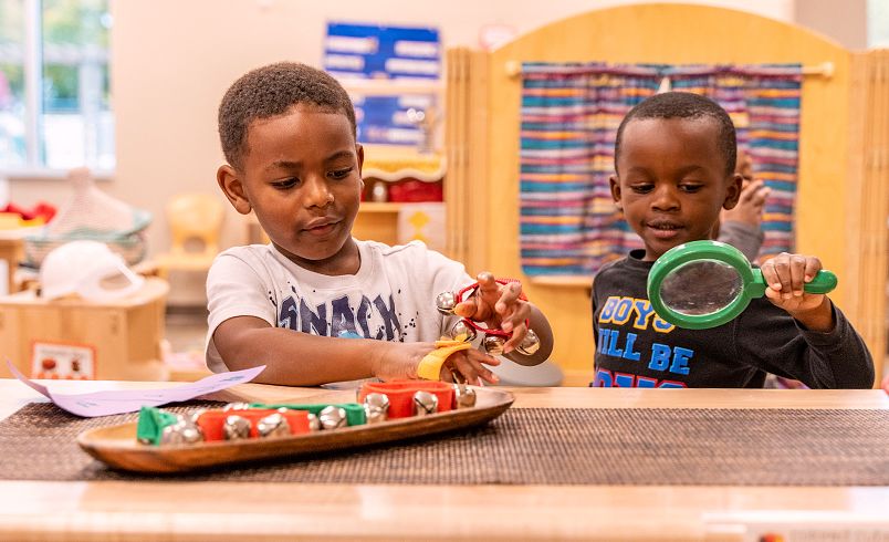 preschool boys playing with instruments