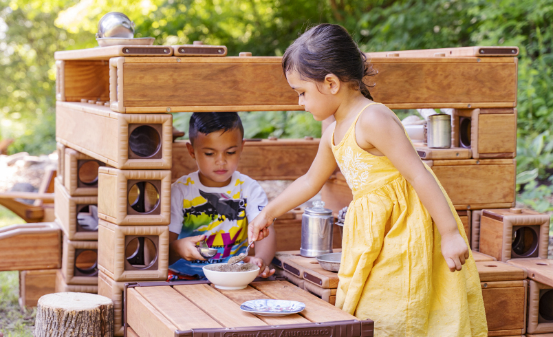 Two children playing with Outlast Blocks