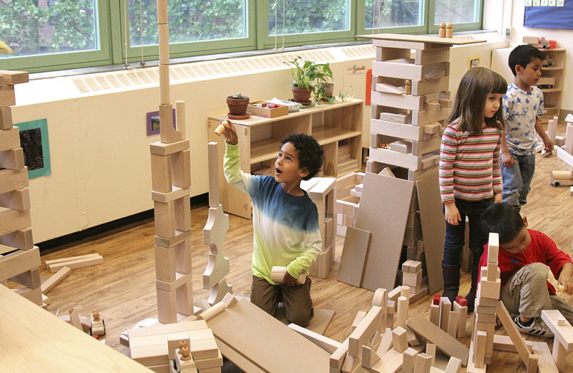 Children playing with Community Playthings Unit blocks