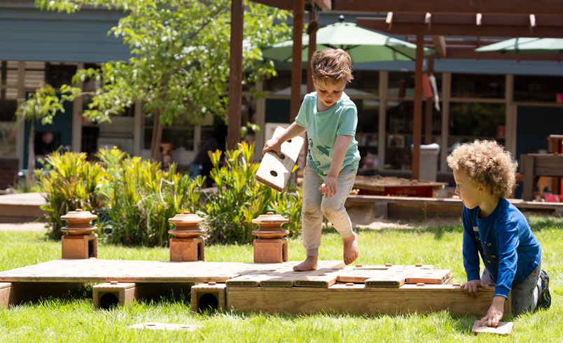 Children playing with Outlast blocks