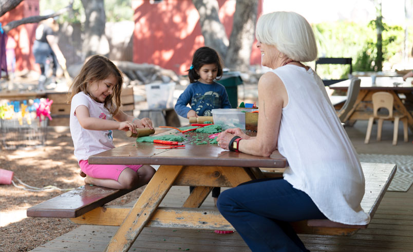 A teacher speaking with a child