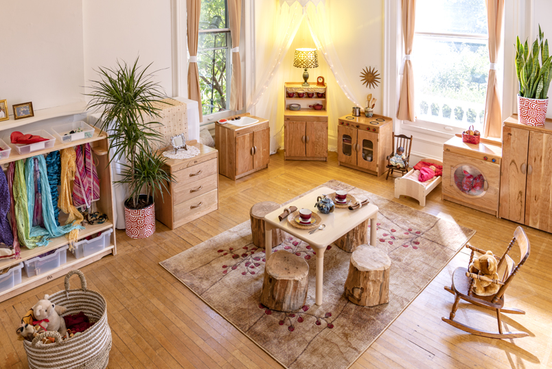 A well propped Dramatic Play space, furnished with Community Playthings furniture