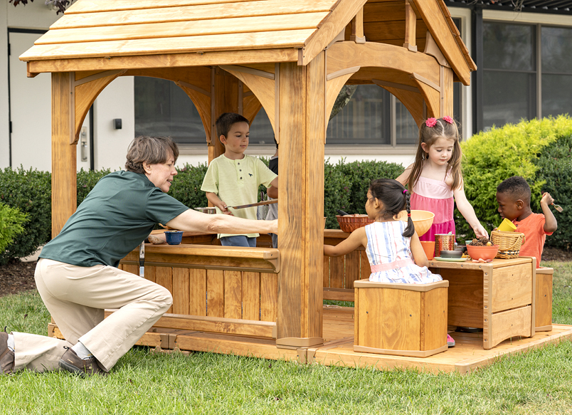 Children playing in Outlast playhouse