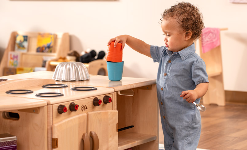 Toddler deeply engaged in play