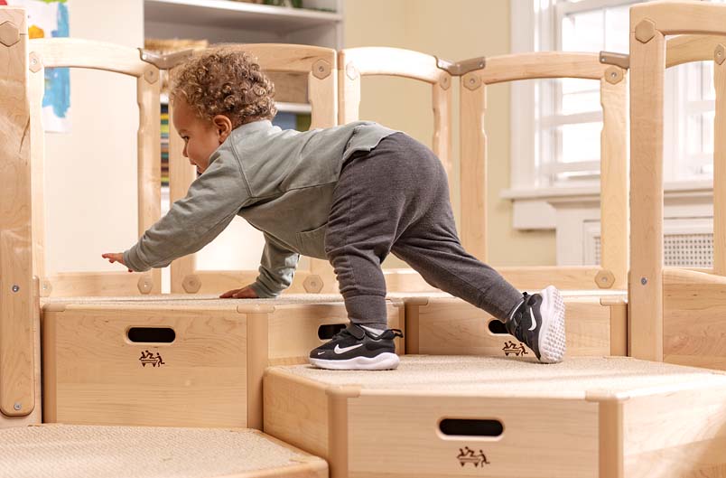 Child climbing up Toddler Climber