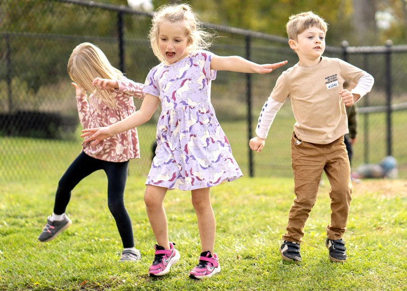 Children jumping and spinning