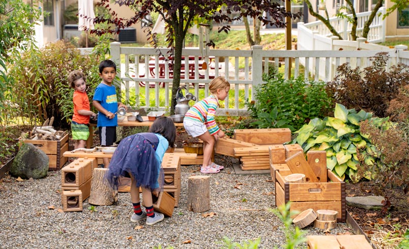 Children playing with Outlast blocks