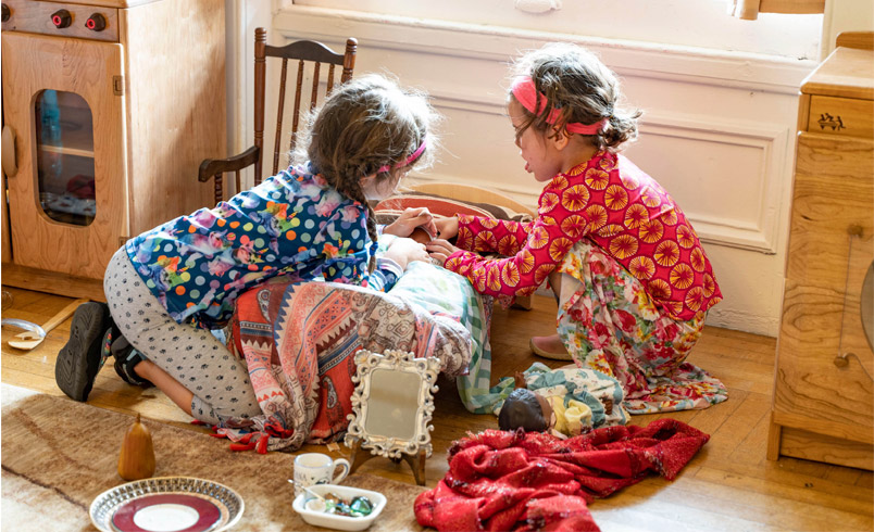 Children playing in drama center