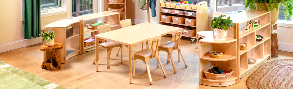 Classroom chairs at table in art center
