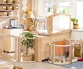 Changing Table divider protecting a play space"