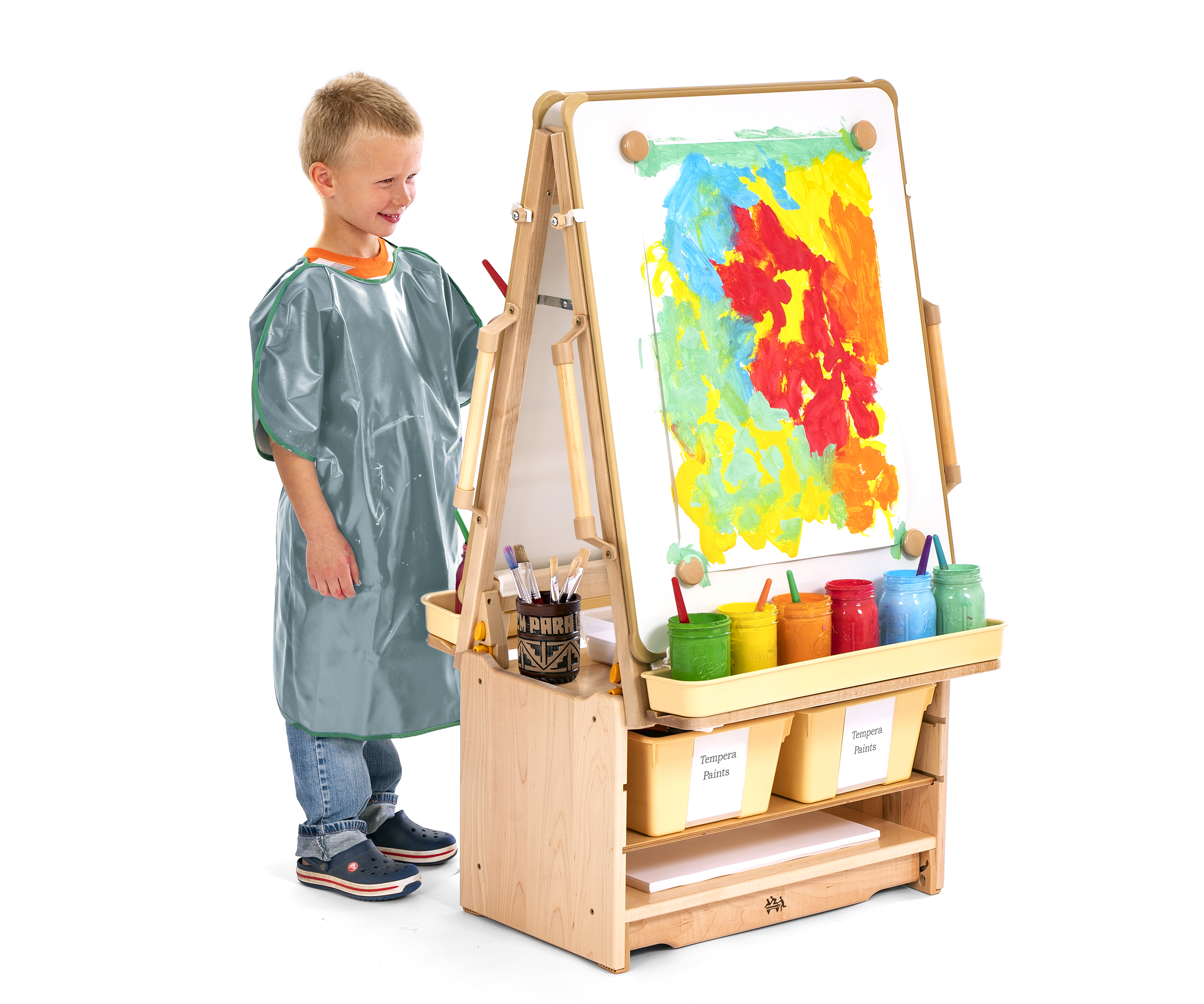 Boy painting at art island