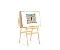 An easel with two whiteboards mounted in landscape orientation, and a children’s picture attached with magnets onto one of the whiteboards