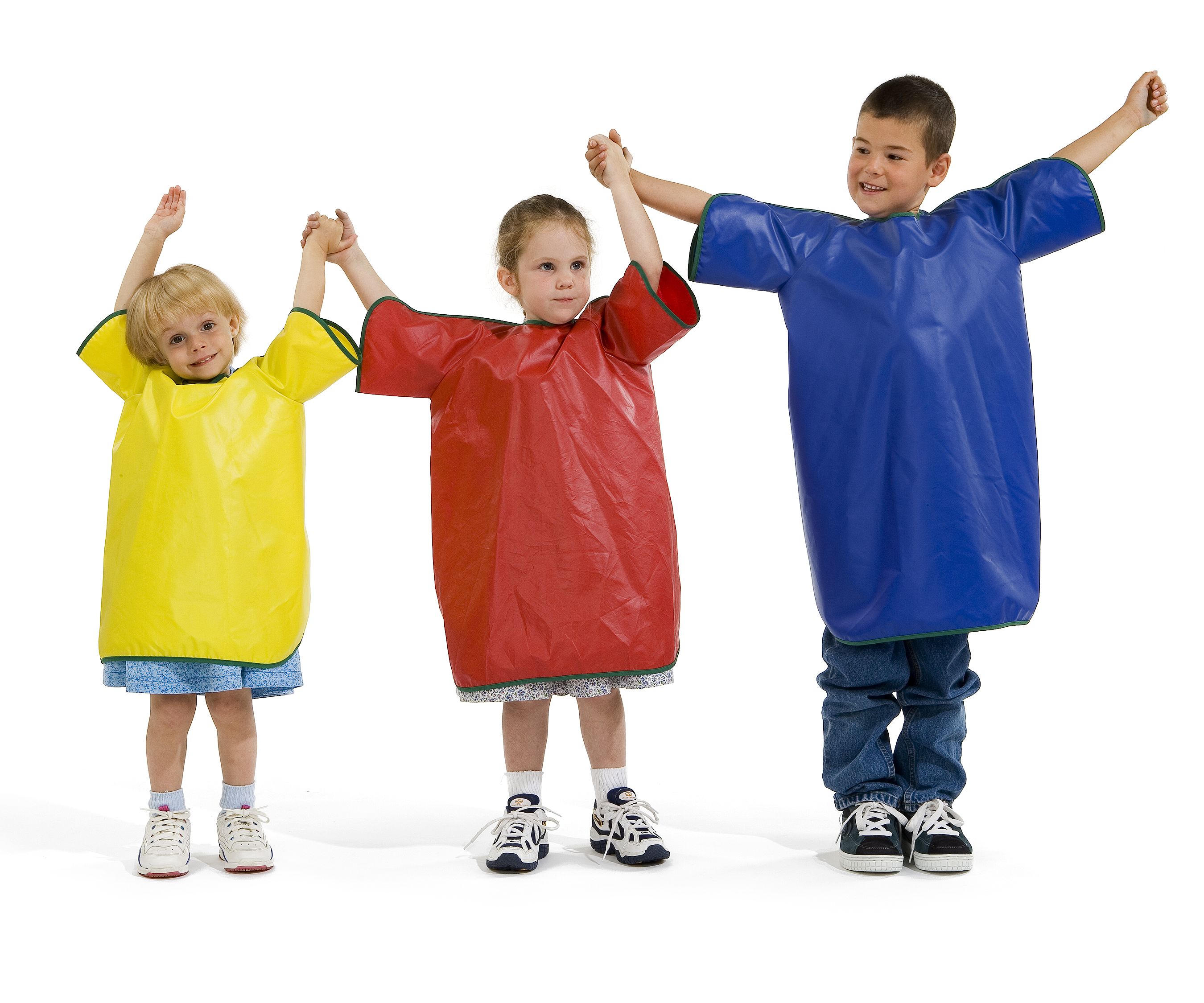 Three children wearing aprons