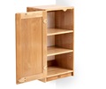 A wall mounted cabinet with open door and two shelves