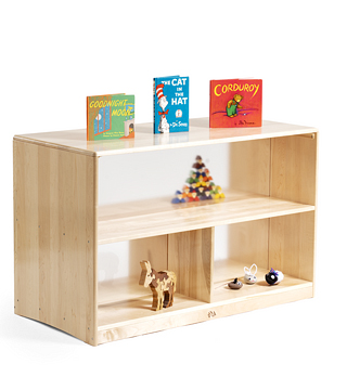 A low shelf with transparent back, containing art and craft material