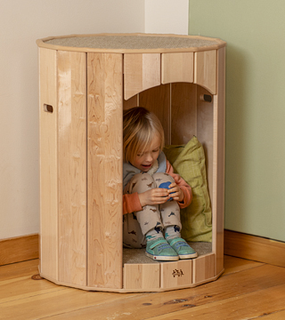 A child in the Calming Nest