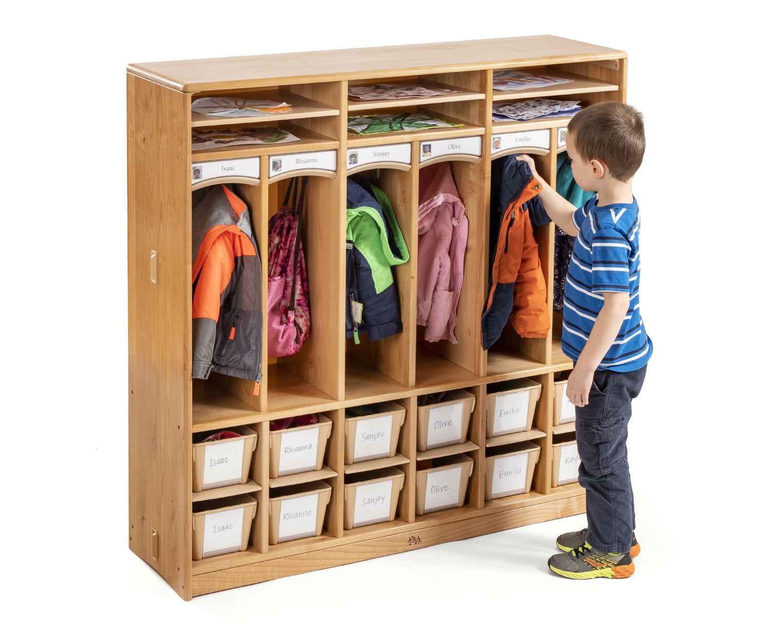 A boy is hanging up his jacket in Compact Preschool Cubby 6 with totes