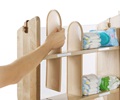 Detail view of the changing table accessory shelf