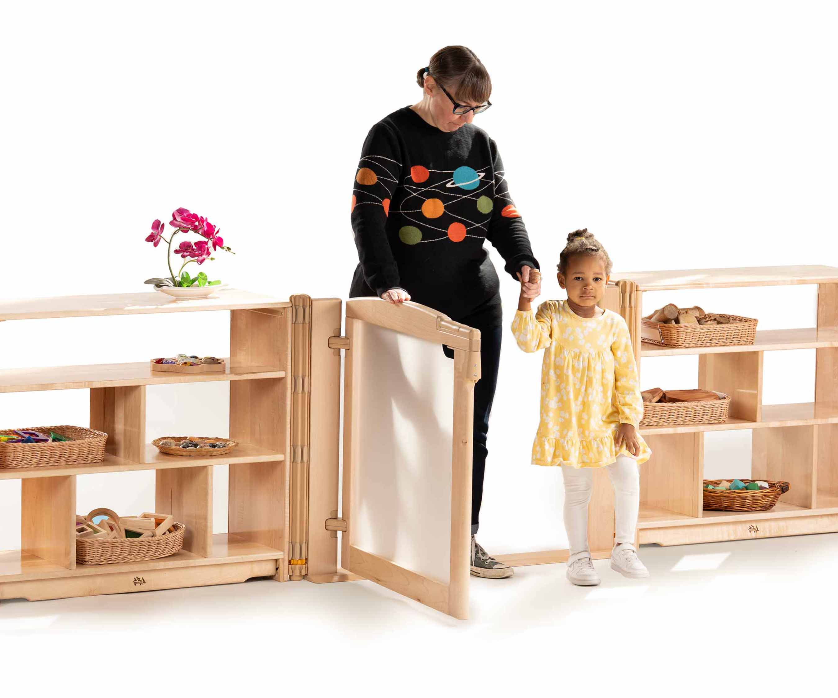Teacher and child walking through Roomscapes Gateway