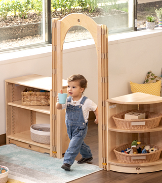 A child walking through an arch