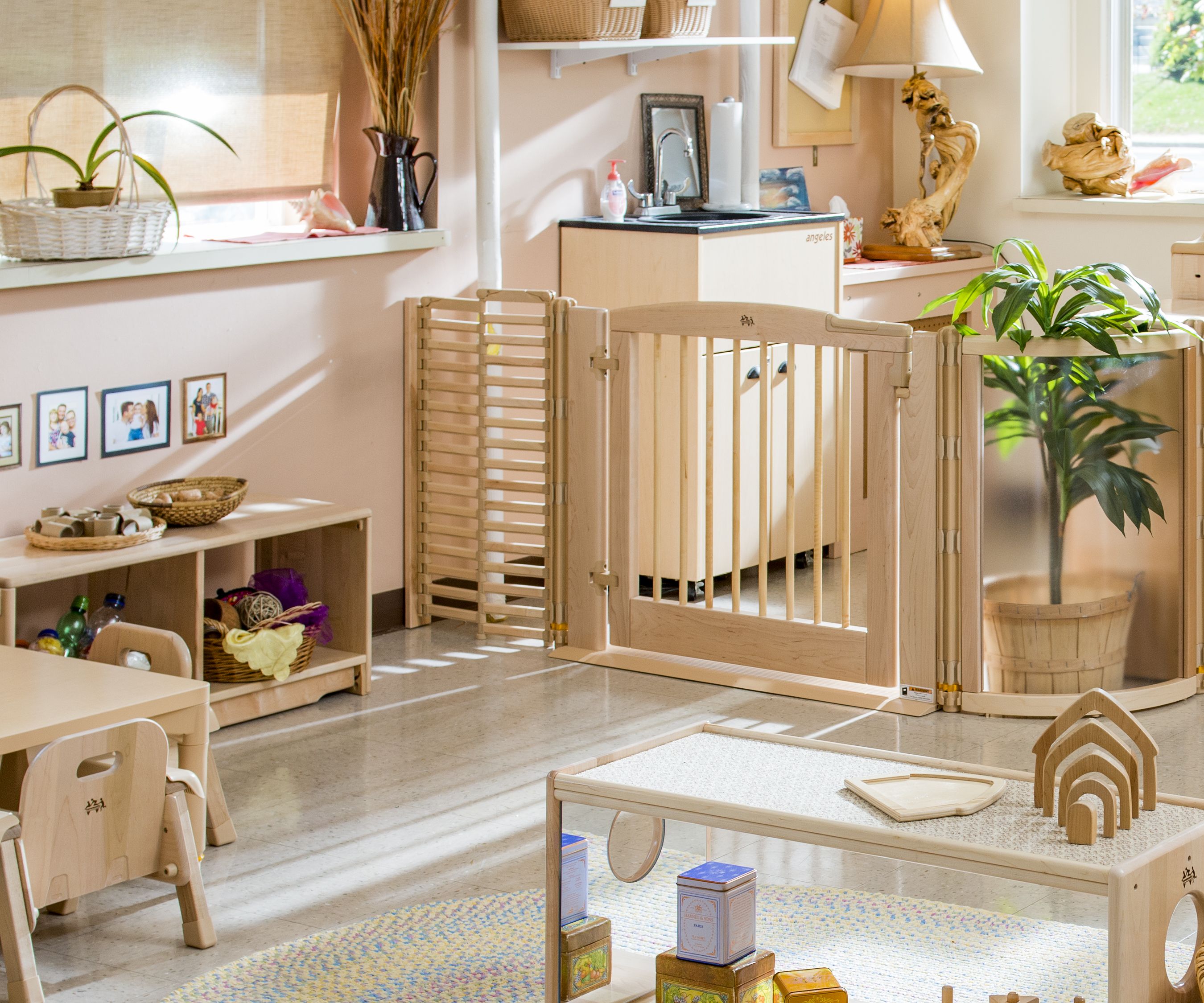 A classroom divider using an adjustable wall anchor