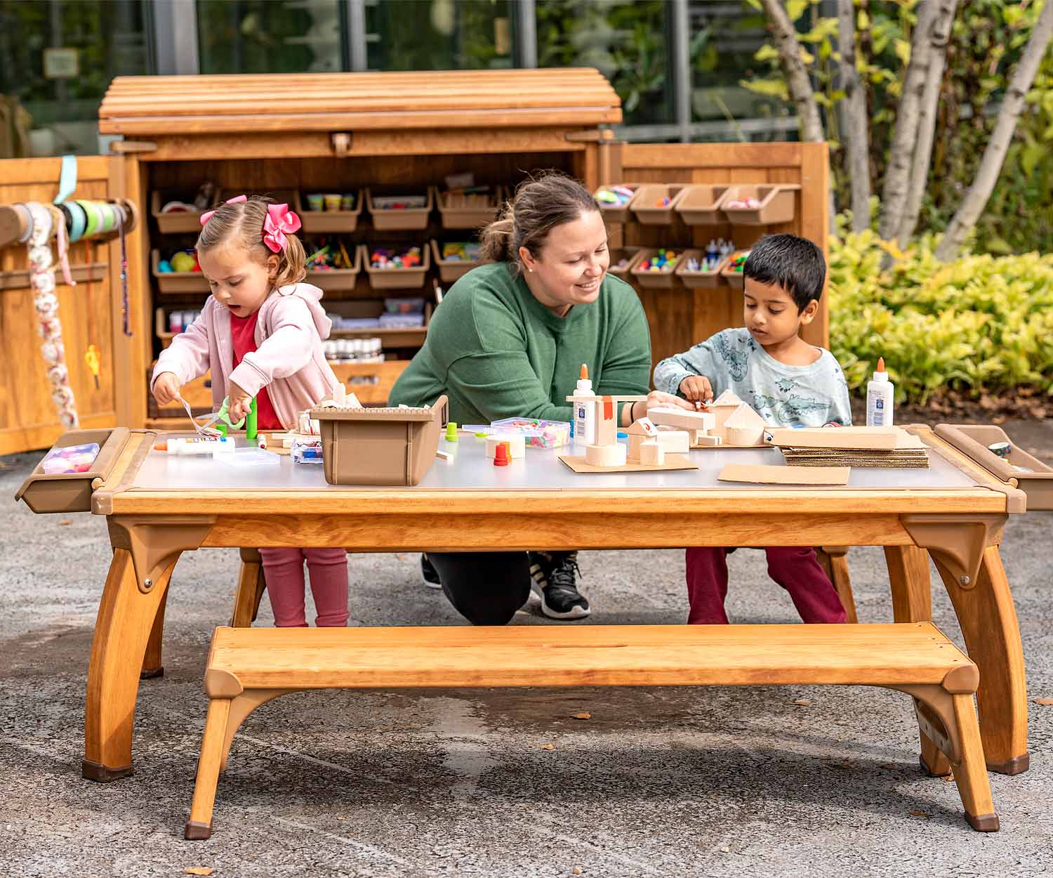 Children making art at Outlast Art table