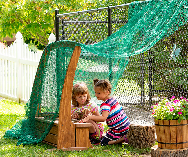 canopy draped over fence outdoors