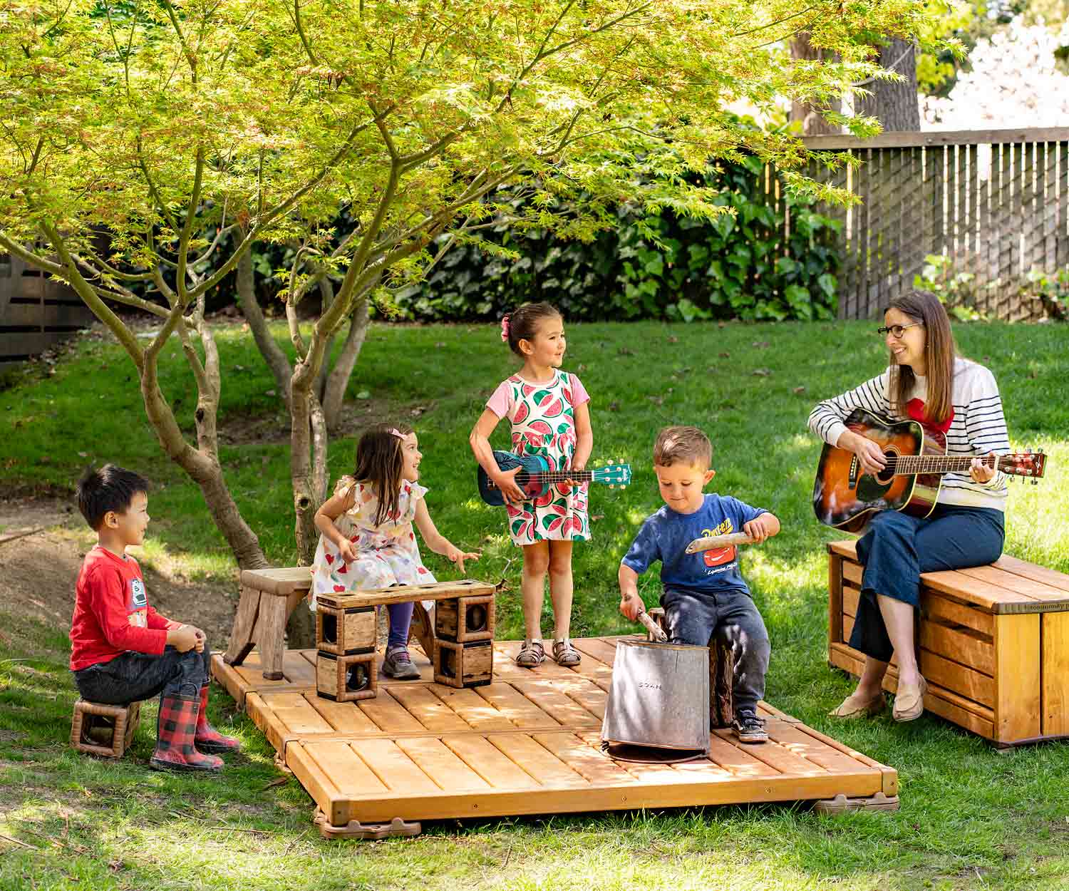kids playing on outdoor stage