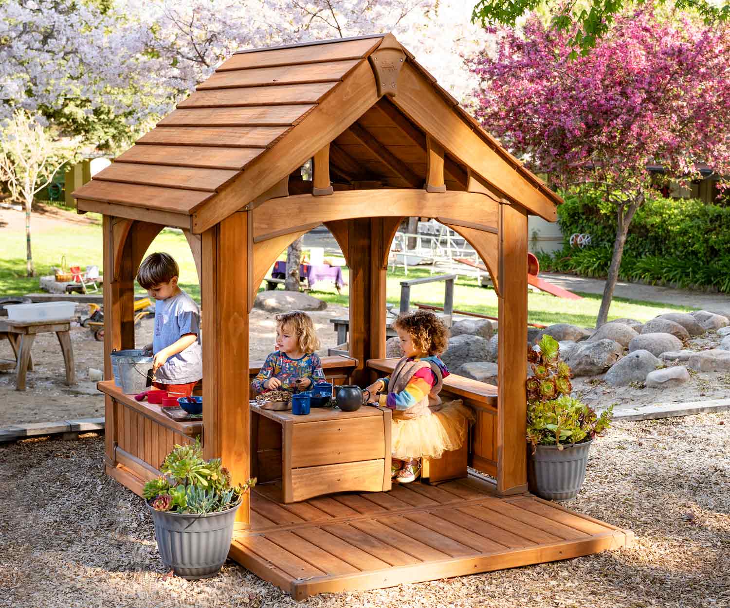 playhouse and cube furniture in use outdoors