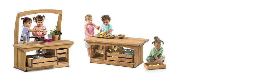 children playing in a mud kitchen