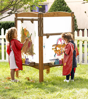 preschool girls painting at Outlast Easel