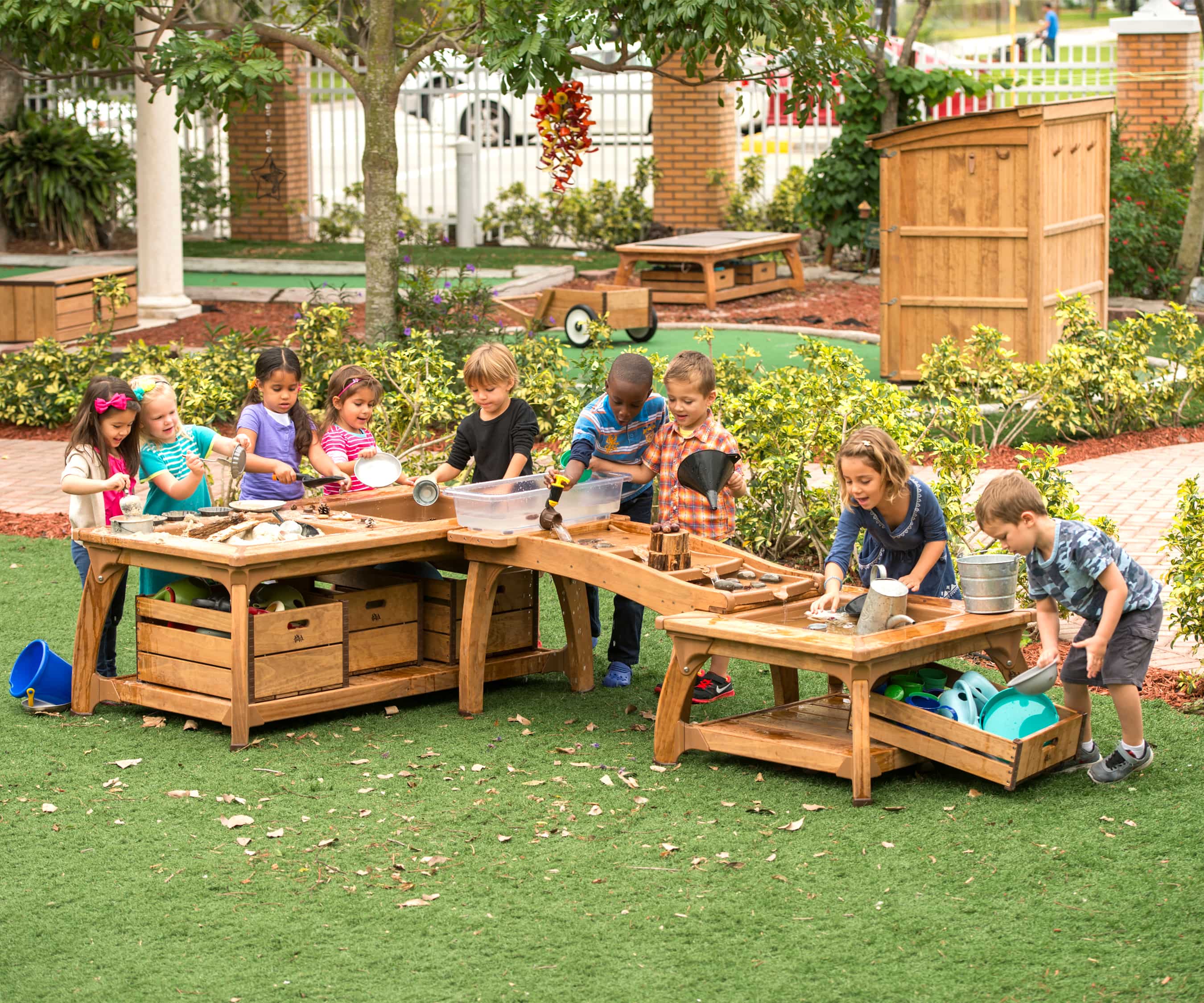 Children playing with Outlast Cascade Play Center