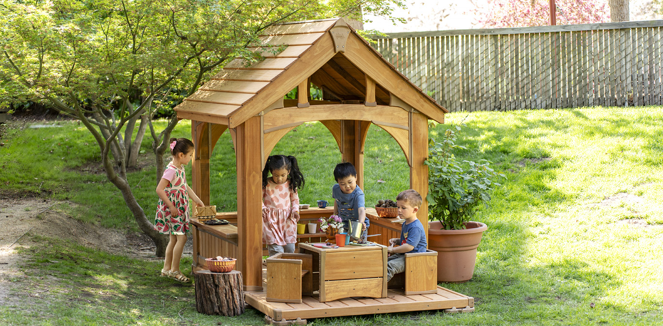 kids playing in a playhouse