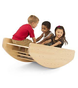 children playing in a rocking boat