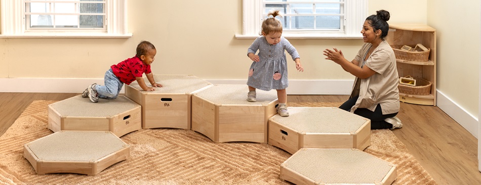 kids playing on an indoor climber