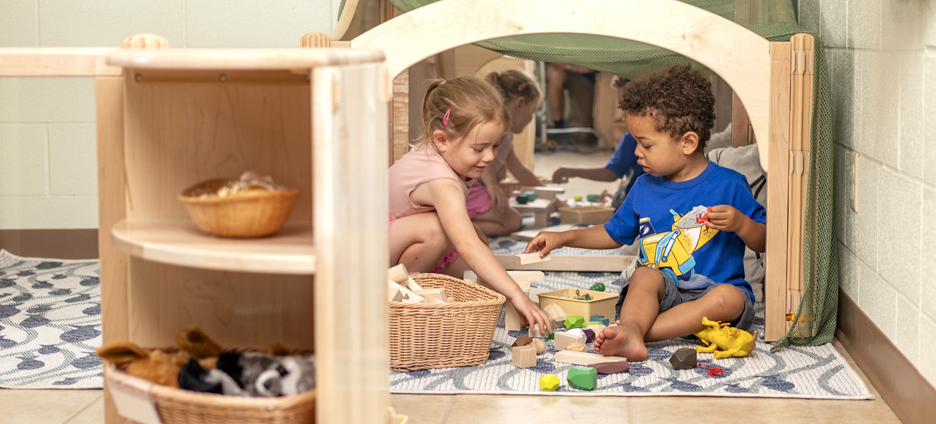 preschool kids playing in a classroom